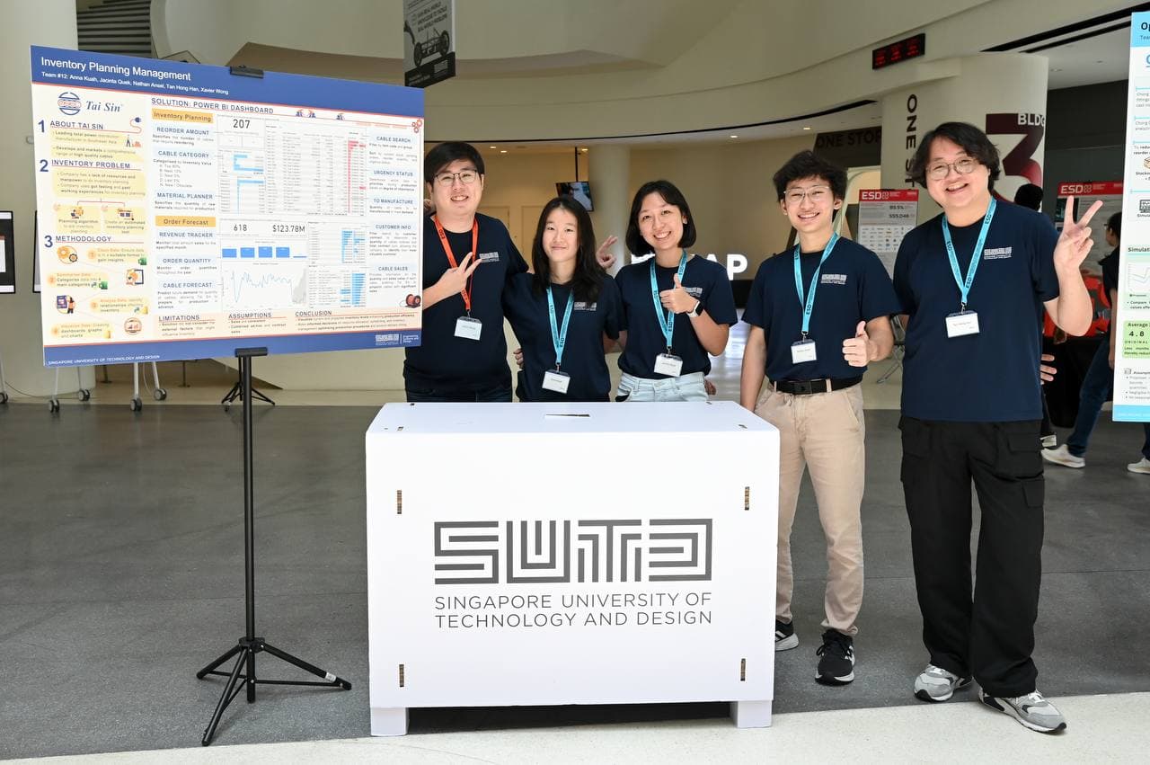 Project team presenting the inventory planning poster at the SUTD showcase